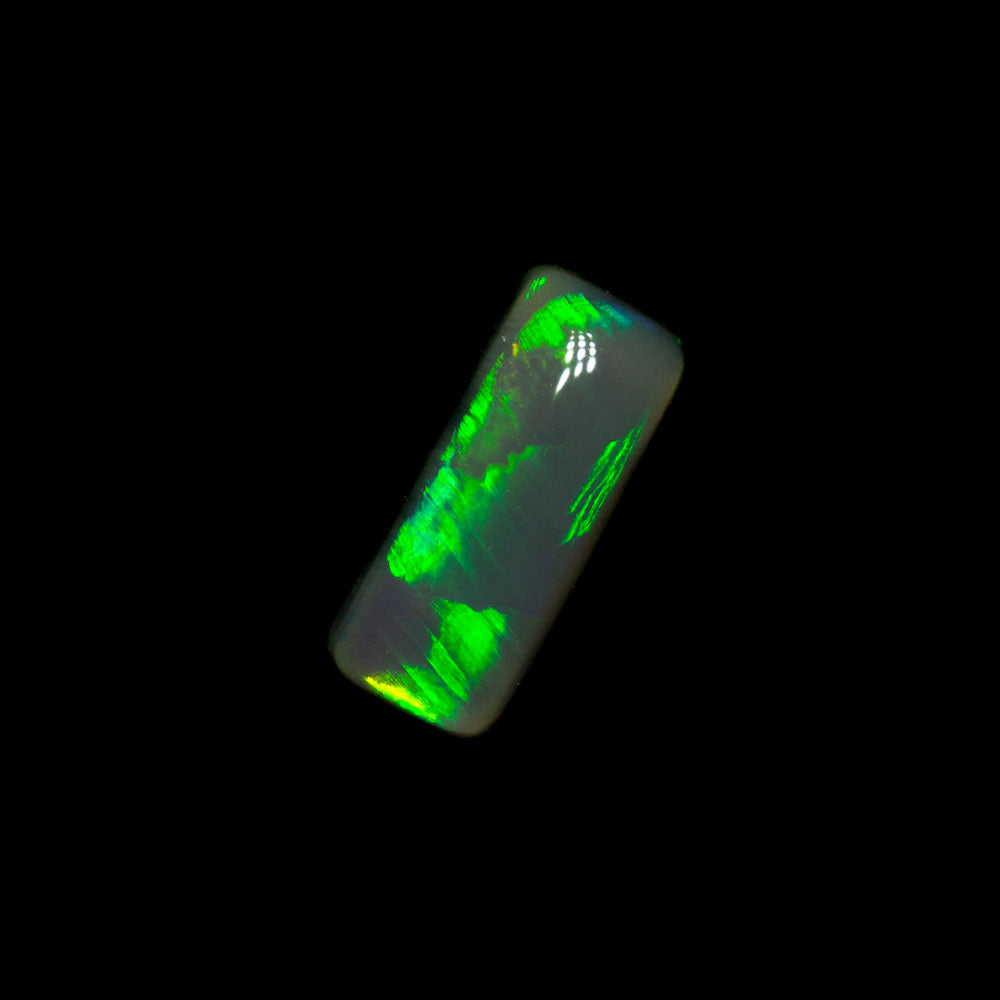 0.76 ct black crystal opal 8.3x3.6x2.9mm