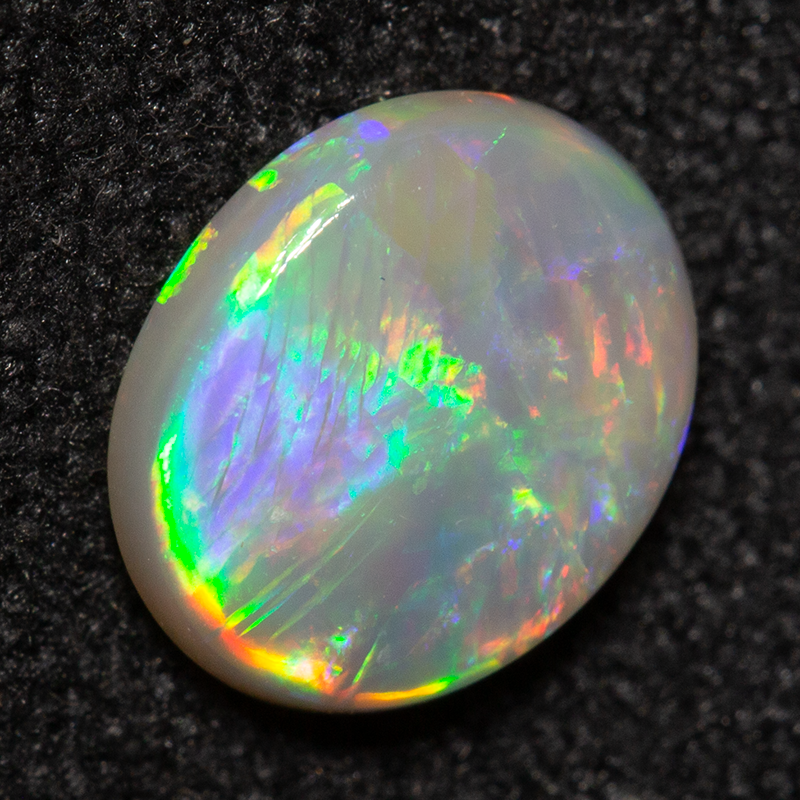 0.76 ct white opal 7.5x6.2x2.3mm