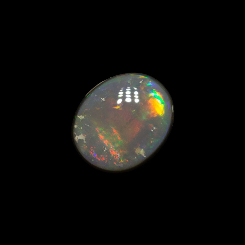 0.76 ct dark opal 6.8x5.7x2.9mm