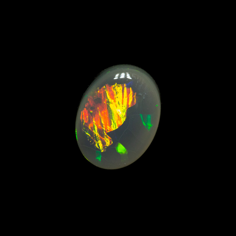 0.77 ct black opal 7.2x5.6x2.7mm