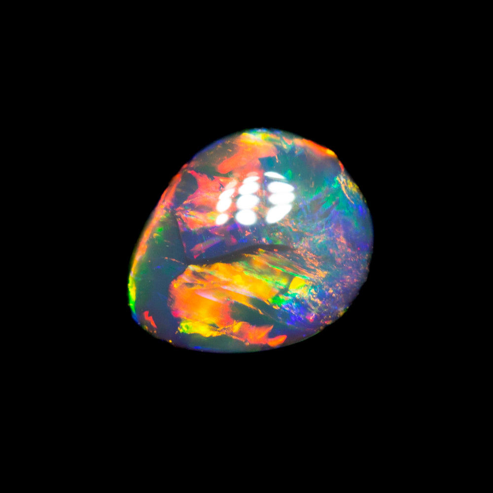 0.77 ct gem black opal 6.7x5.6x3.2mm