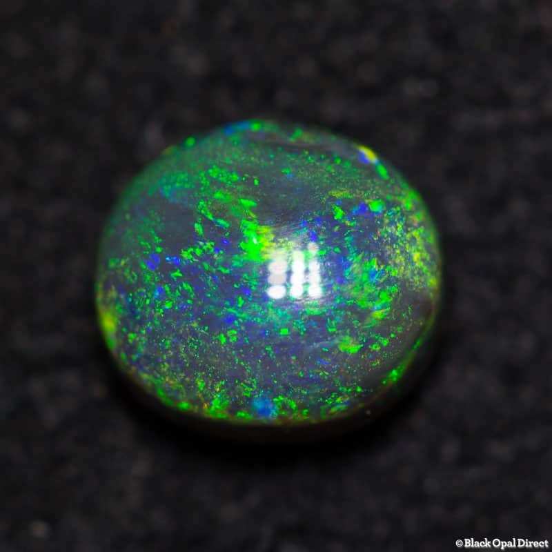 0.77 ct dark opal 6x5x3.5mm