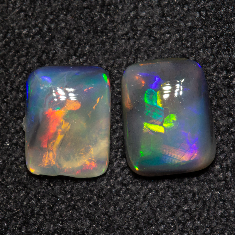 0.78 ct black opal pair 5.7x4.3x2mm