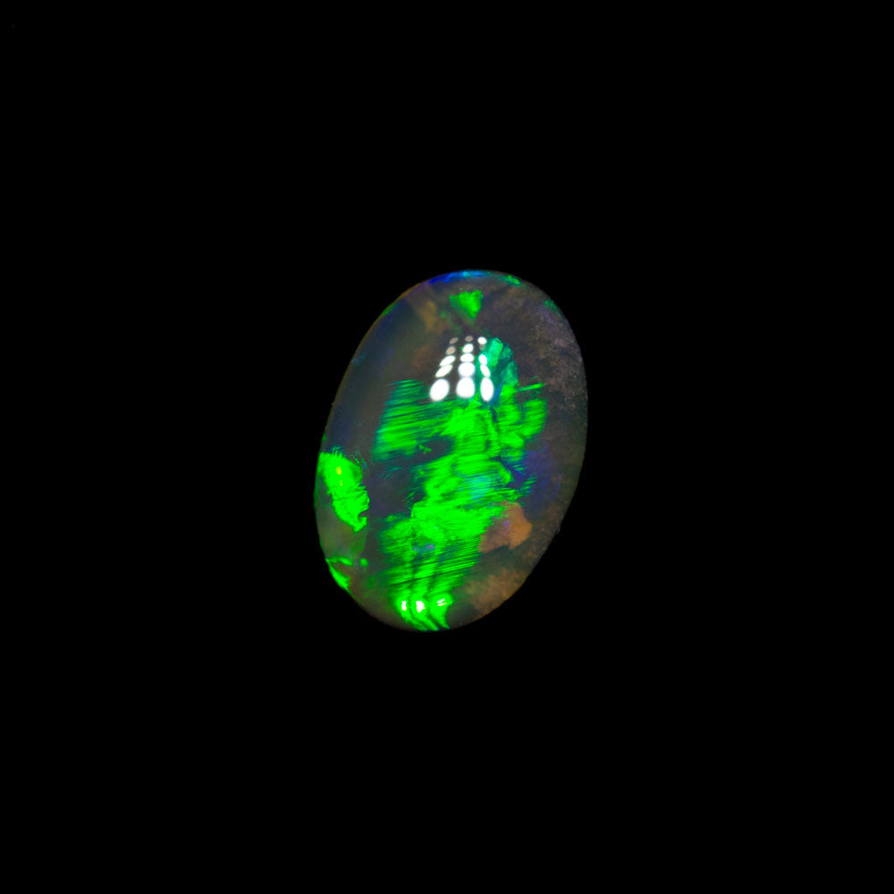 0.78 ct black crystal opal 7.5x5.3x2.8mm
