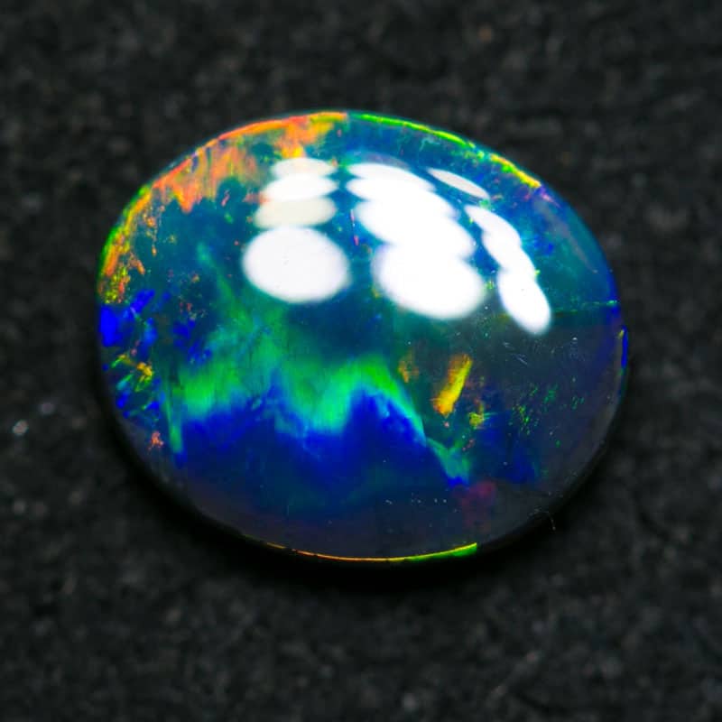 0.78 ct gem black opal 7.5x6x2mm