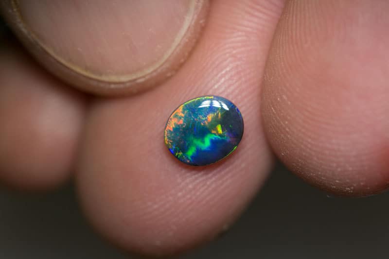 0.78 ct gem black opal 7.5x6x2mm