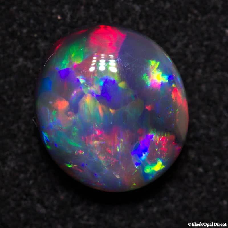 0.78 ct gem black opal 7x6x3mm