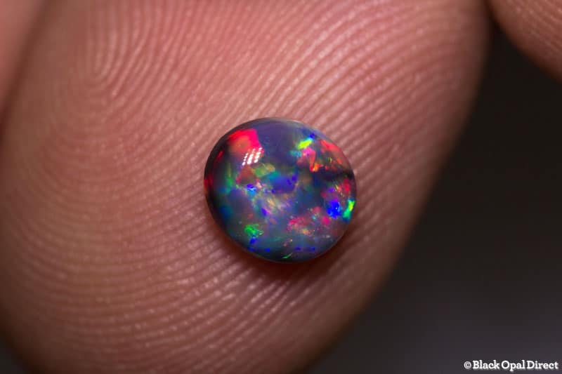 0.78 ct gem black opal 7x6x3mm