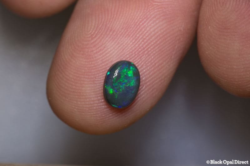 0.79 ct black opal 7x5x2mm