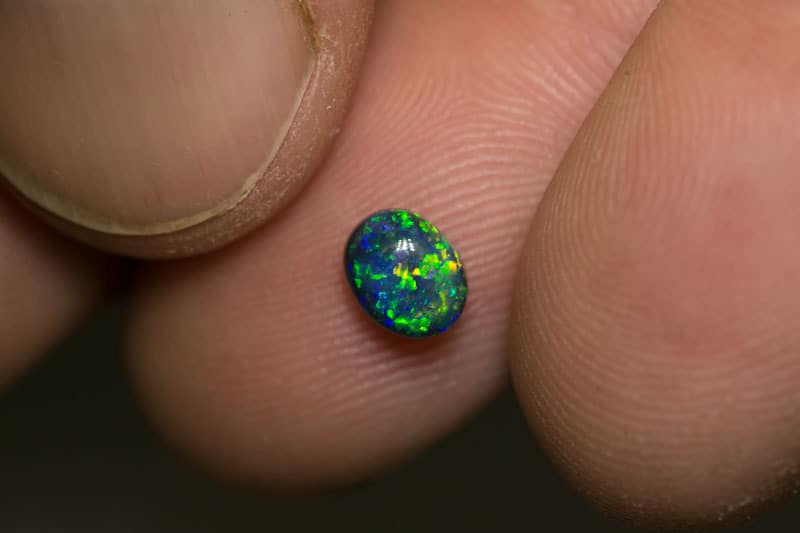 0.79 ct gem black opal 6x5x4mm