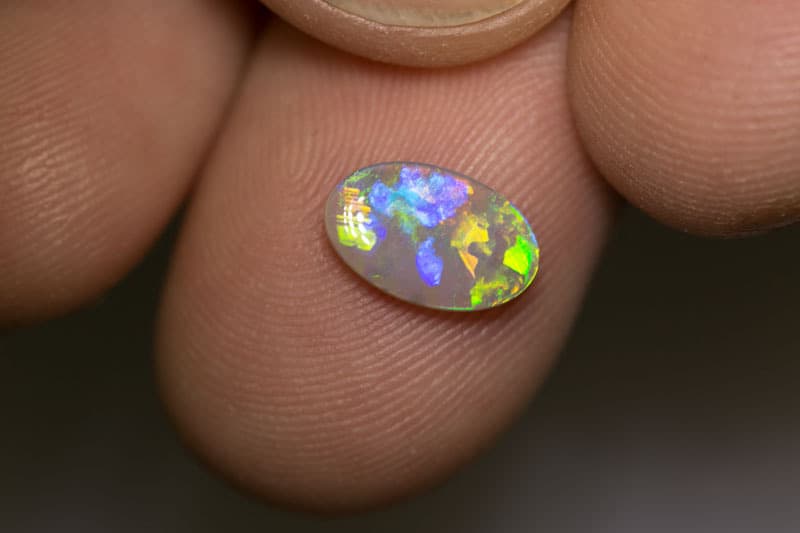0.79 ct dark opal 10x6x2mm