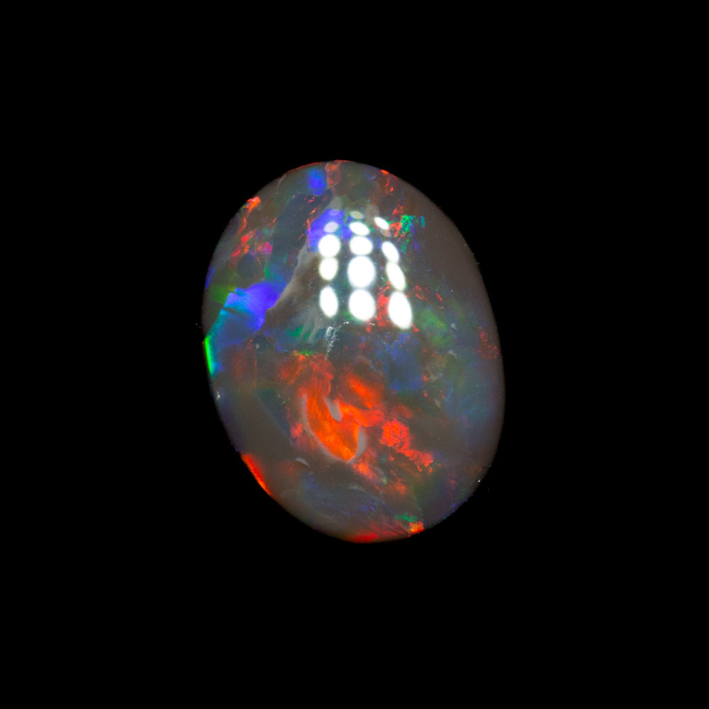 0.80 ct black opal 8.2x6.3x2.4mm