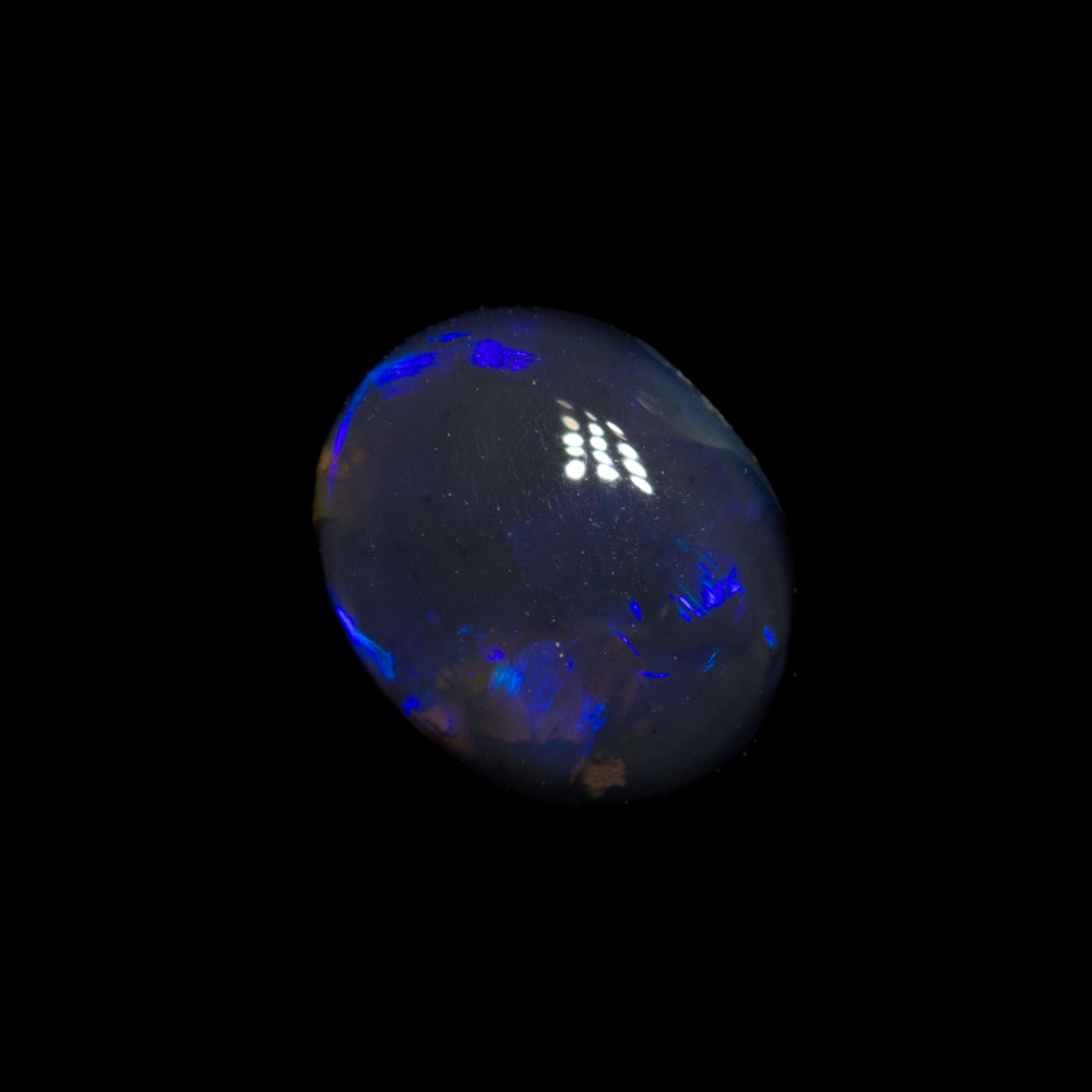 0.80 ct black opal 7x5.8x3.2mm