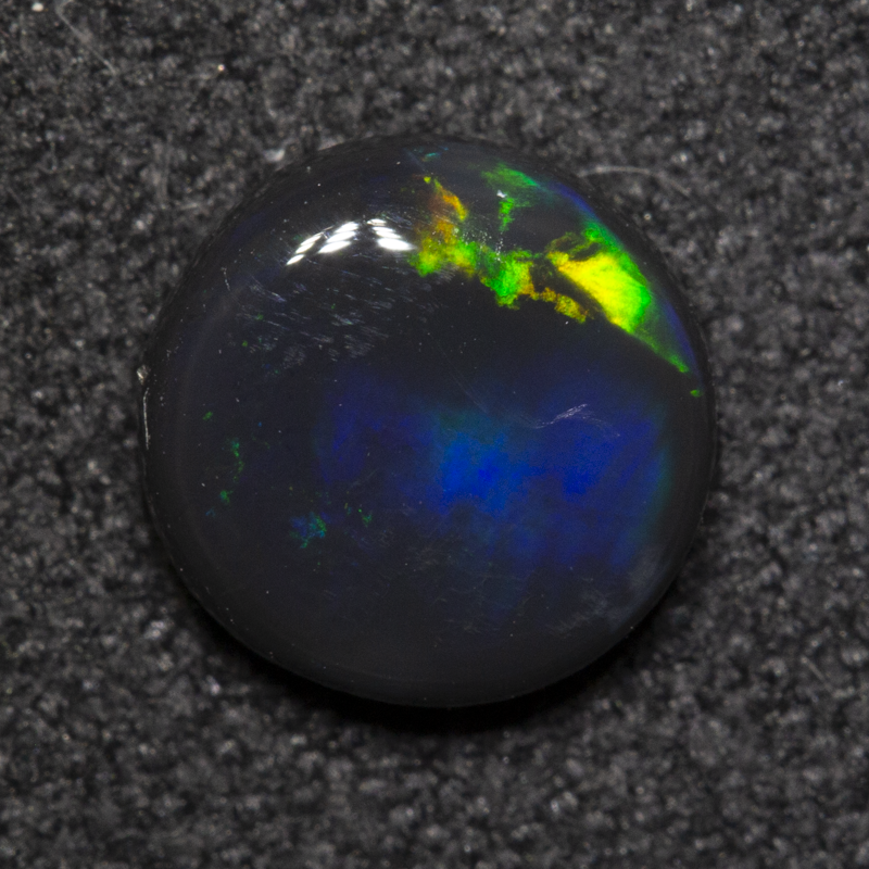 0.80 ct black opal 6.8x6.8x2.6mm