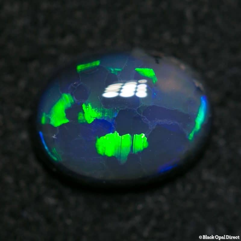 0.80 ct black opal 7x5x2.5mm
