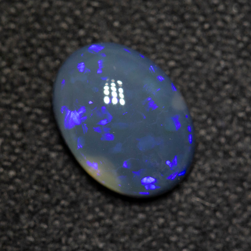 0.81 ct black opal 7.6x5.6x3.1mm