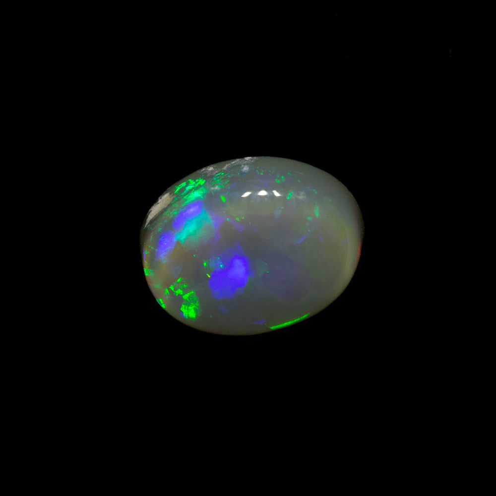 0.81 ct dark crystal opal 7.3x5.7x2.8mm