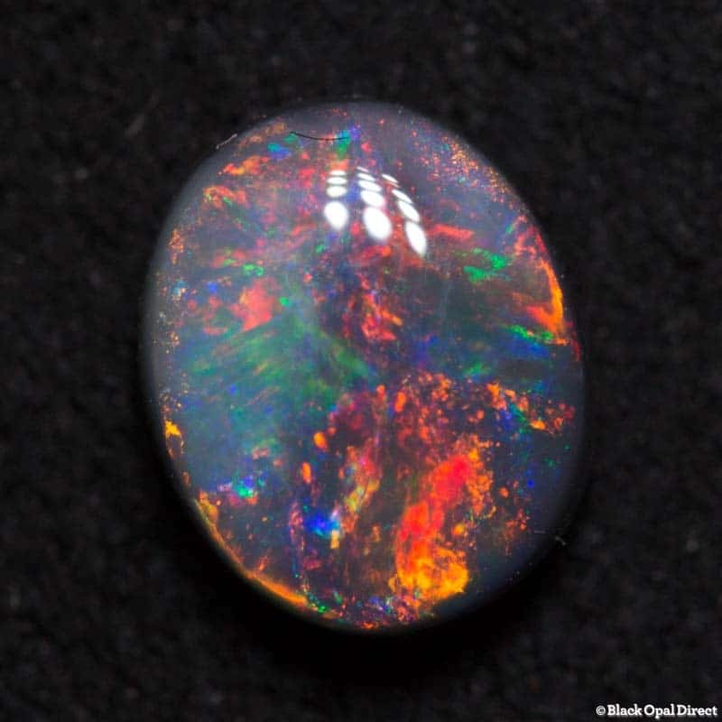 0.81 ct black opal gem 6.5x5x3mm