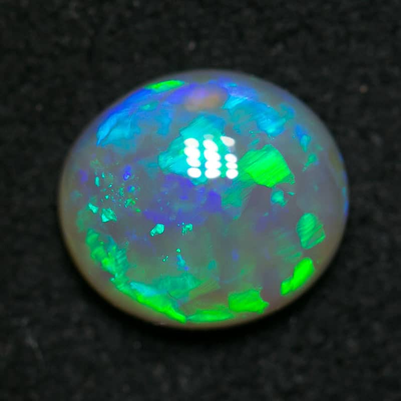 0.81 ct green crystal opal 7x6x3mm