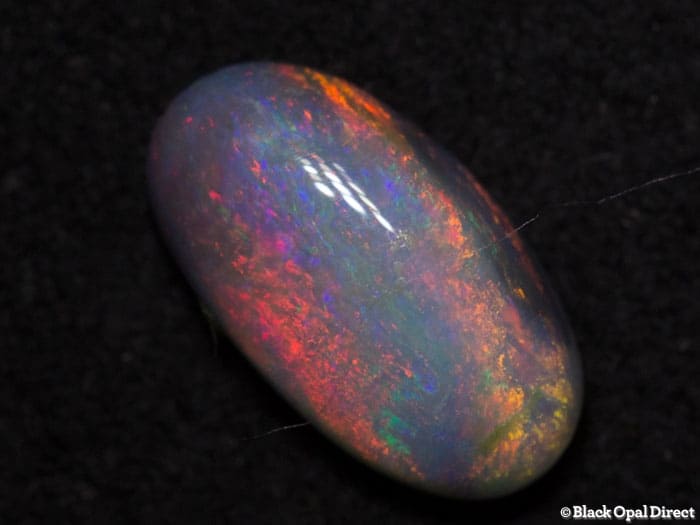 0.81 ct semi black opal 9x5x3mm