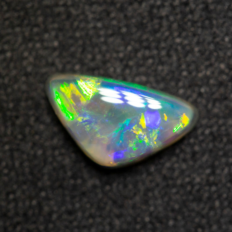 0.82 ct dark opal 8.6x4.9x3mm