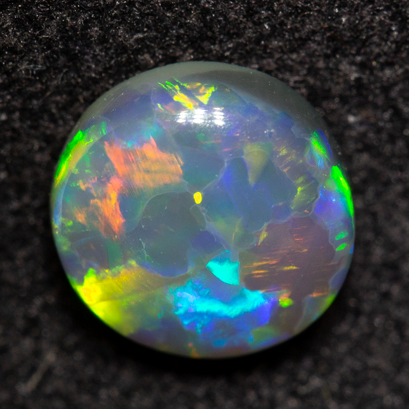 0.82 ct dark opal 6.4x6.2x3.2mm