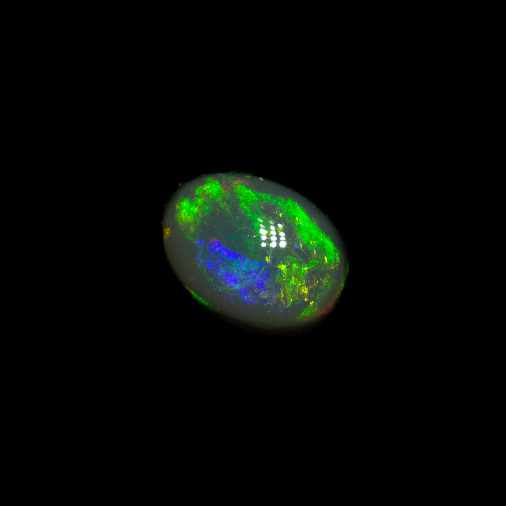 0.82 ct black opal 6.9x5.1x3.8mm