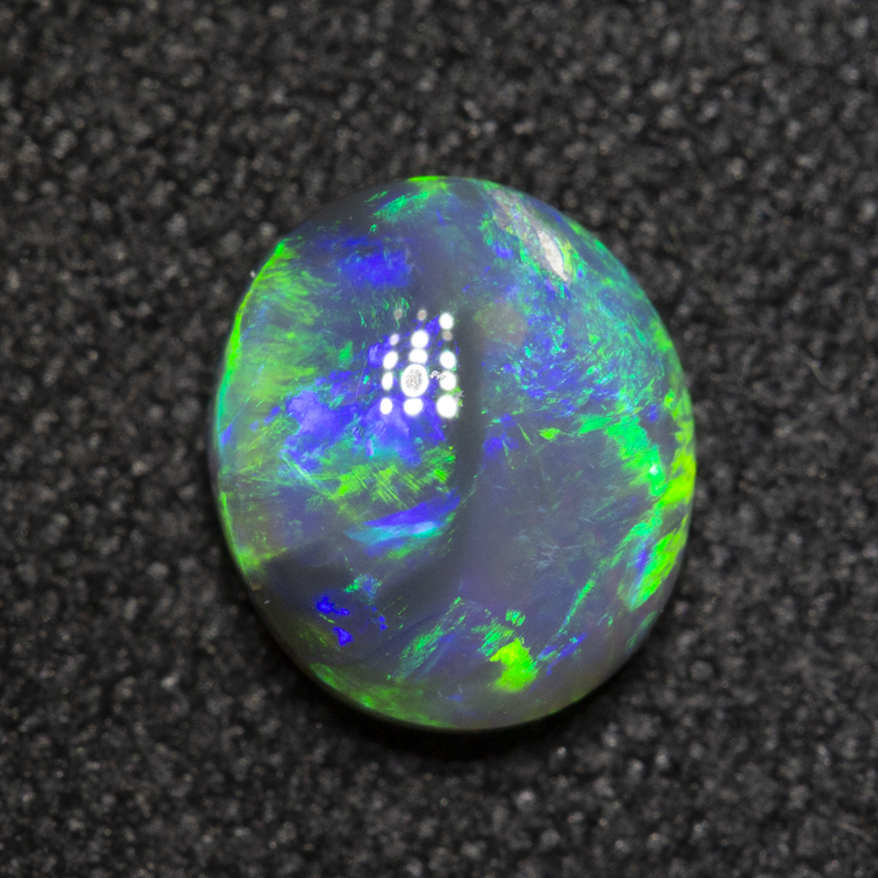0.82 ct dark crystal opal 7x6.1x3mm
