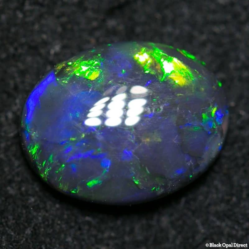 0.83 ct black opal 7.5x6x2mm