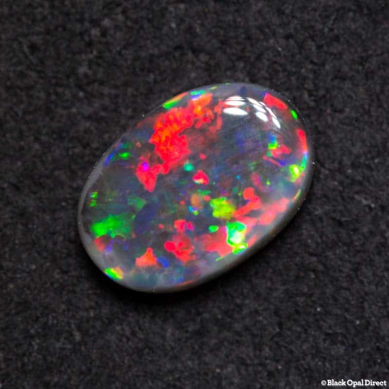 0.83 ct black opal gem 7.5x5x3mm