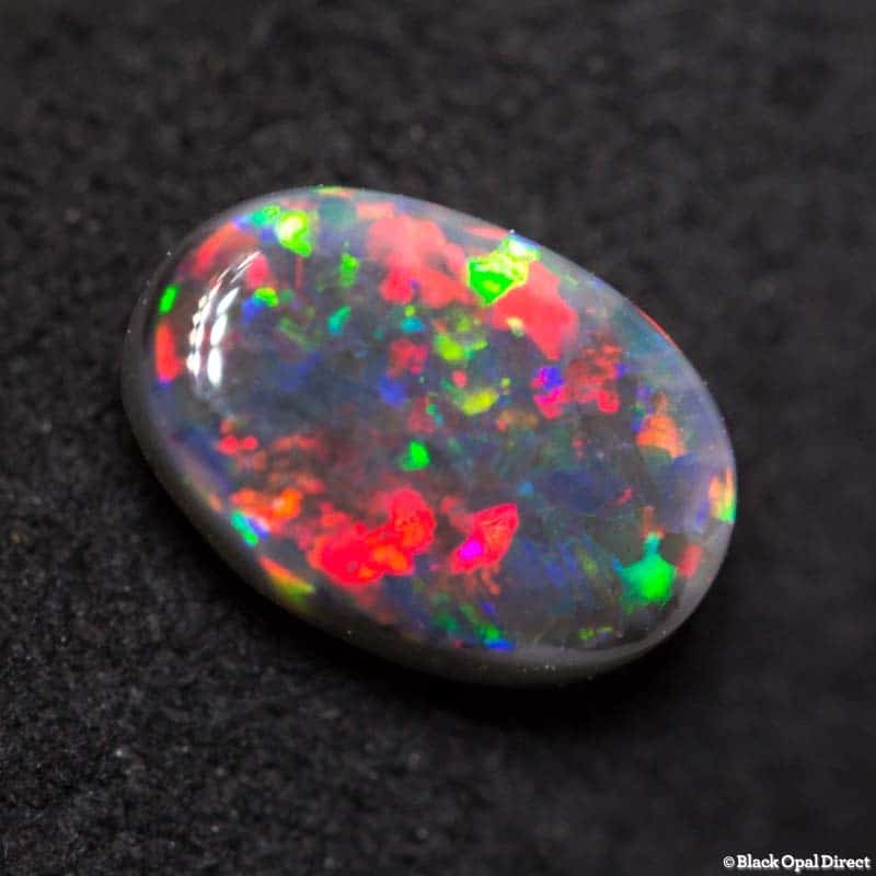 0.83 ct black opal gem 7.5x5x3mm