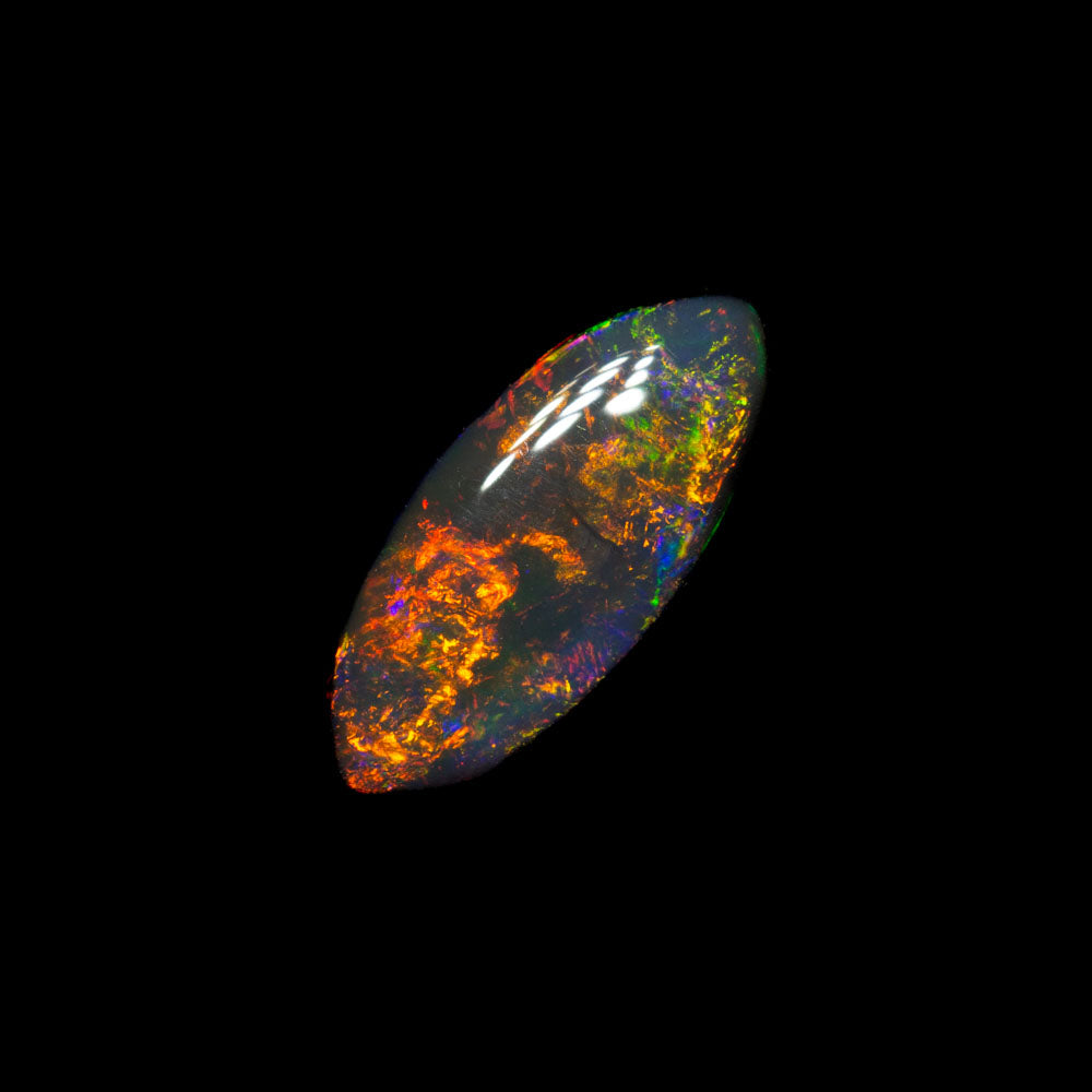 0.84 ct double-sided black opal 9.6x4.5x2.8mm