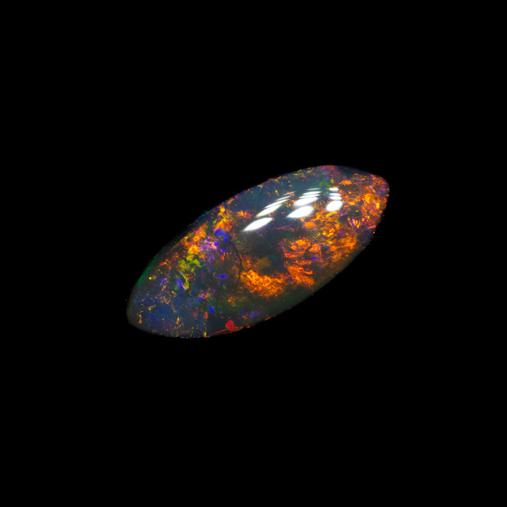0.84 ct double-sided black opal 9.6x4.5x2.8mm
