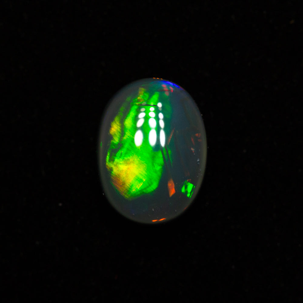 0.84 ct black opal 7.3x5.5x3.2mm