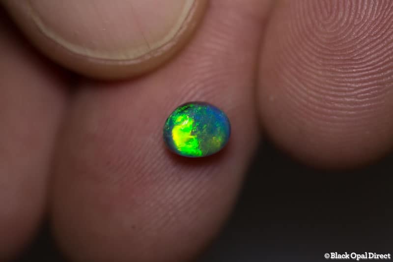 0.84 ct black opal 6.3x4.9x4mm