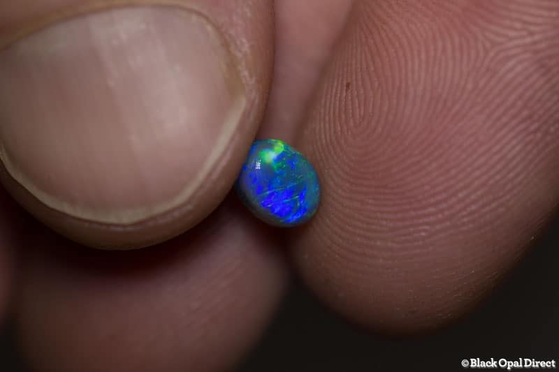 0.84 ct black opal 6.3x4.9x4mm