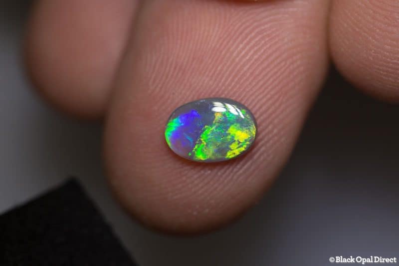 0.84 ct dark opal 8.5x6x2mm