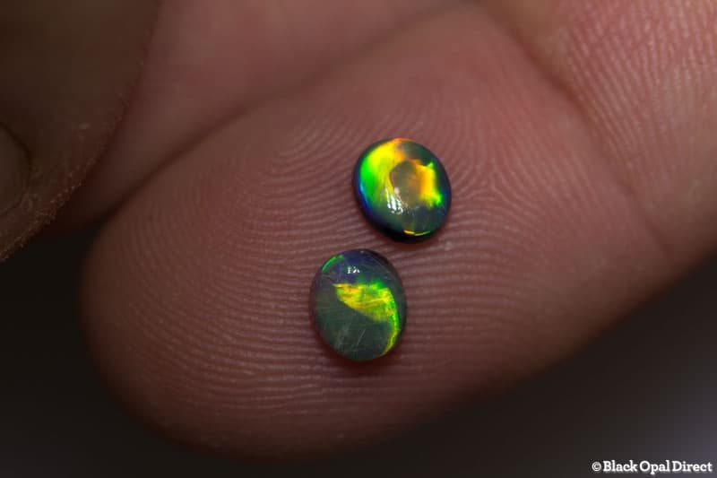 0.84 ct semi black opal pair 5x45mm