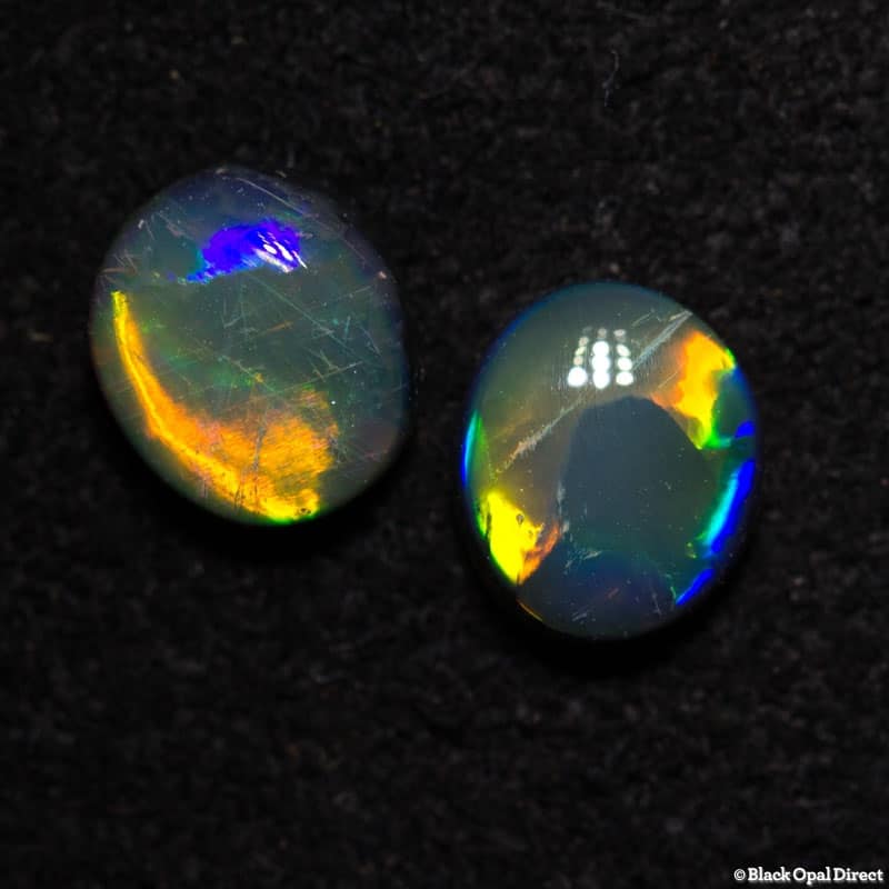 0.84 ct semi black opal pair 5x45mm