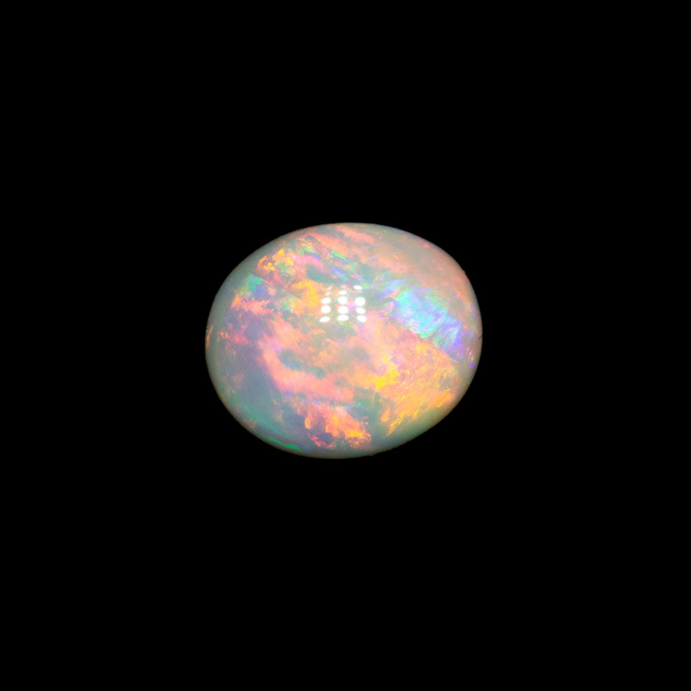 0.85 ct double-sided white opal 6.7x5.7x3.3mm