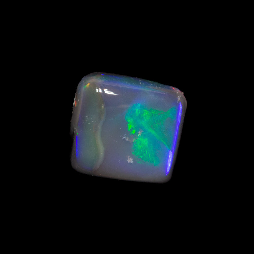 0.85 ct black opal 6.3x5.8x2.8mm