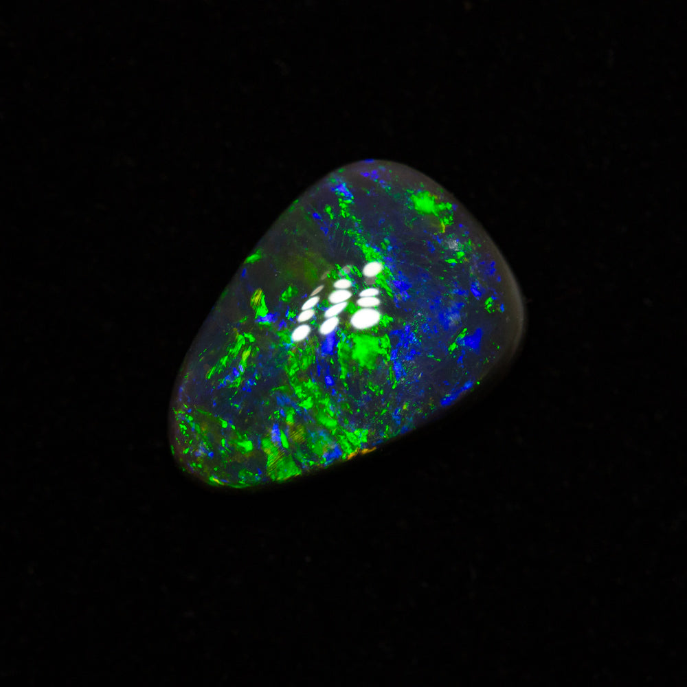 0.85 ct black opal 8.7x6.1x2.8mm