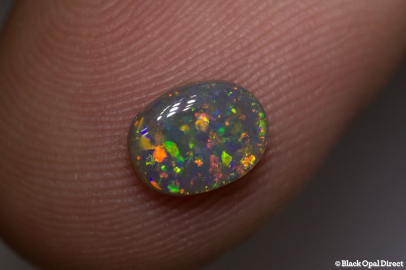 0.85 ct semi black opal 7.5x6x2mm