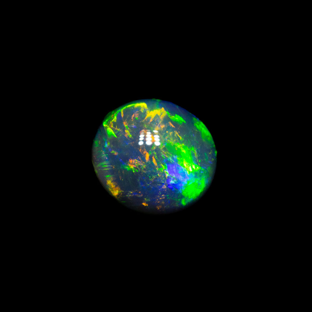 0.86 ct gem black opal 6.3x5.7x3.6mm