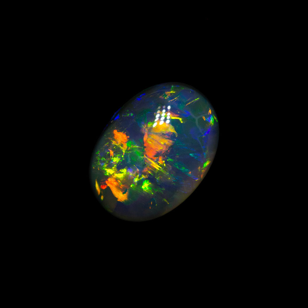 0.86 ct double-sided black opal 8.1x5.8x2.7mm