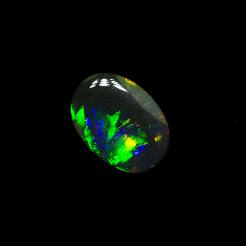 0.86 ct double-sided black opal 8.1x5.8x2.7mm