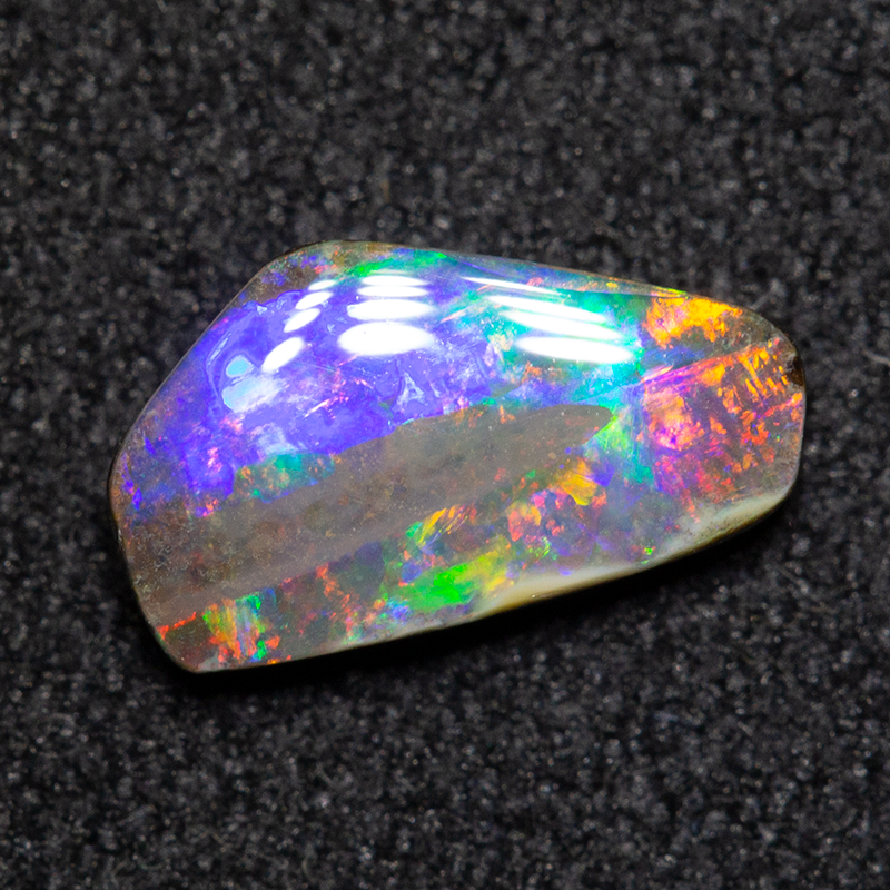 0.86 ct boulder opal 8.6x4.9x2.1mm