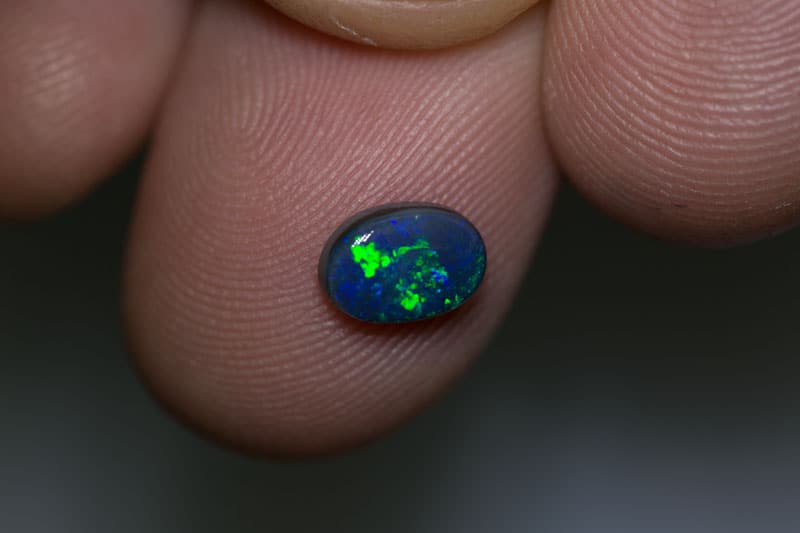 0.86 ct black opal 7.5x5x2.5mm