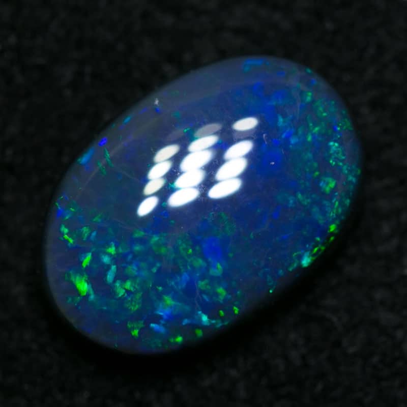 0.86 ct black opal 7.5x5x2.5mm