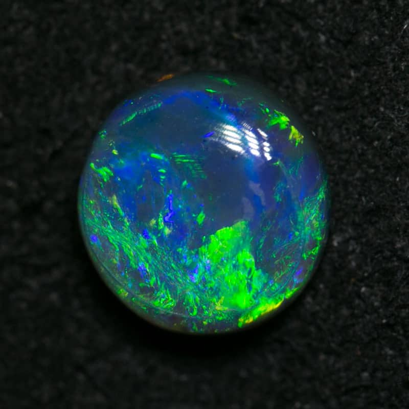 0.86 ct black opal 6.5x6.5x3mm